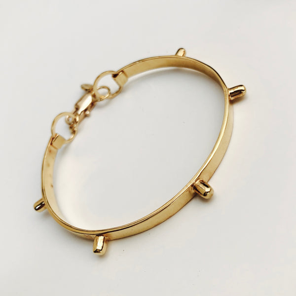 Cuff LIBRE dorado
